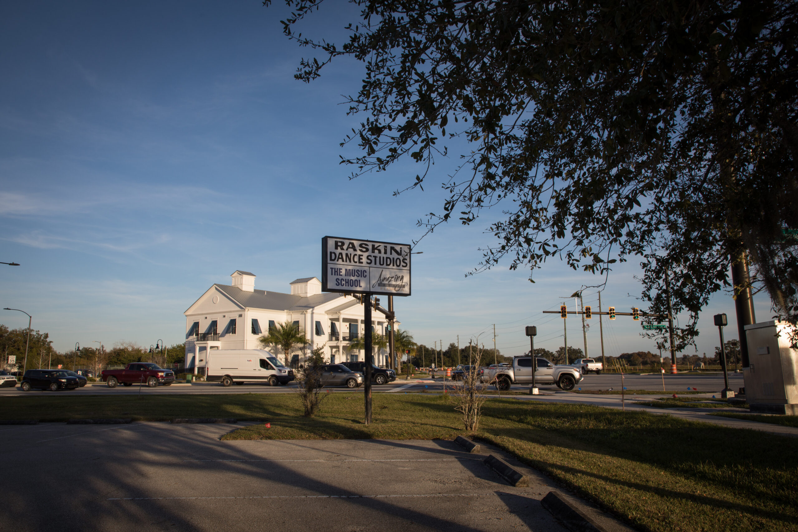 The Raskin Dance Studio sign stands tall on the corner of the busy intersection of Partin Settlement Road and Cross Prairie Parkway in Kissimmee, Fla.